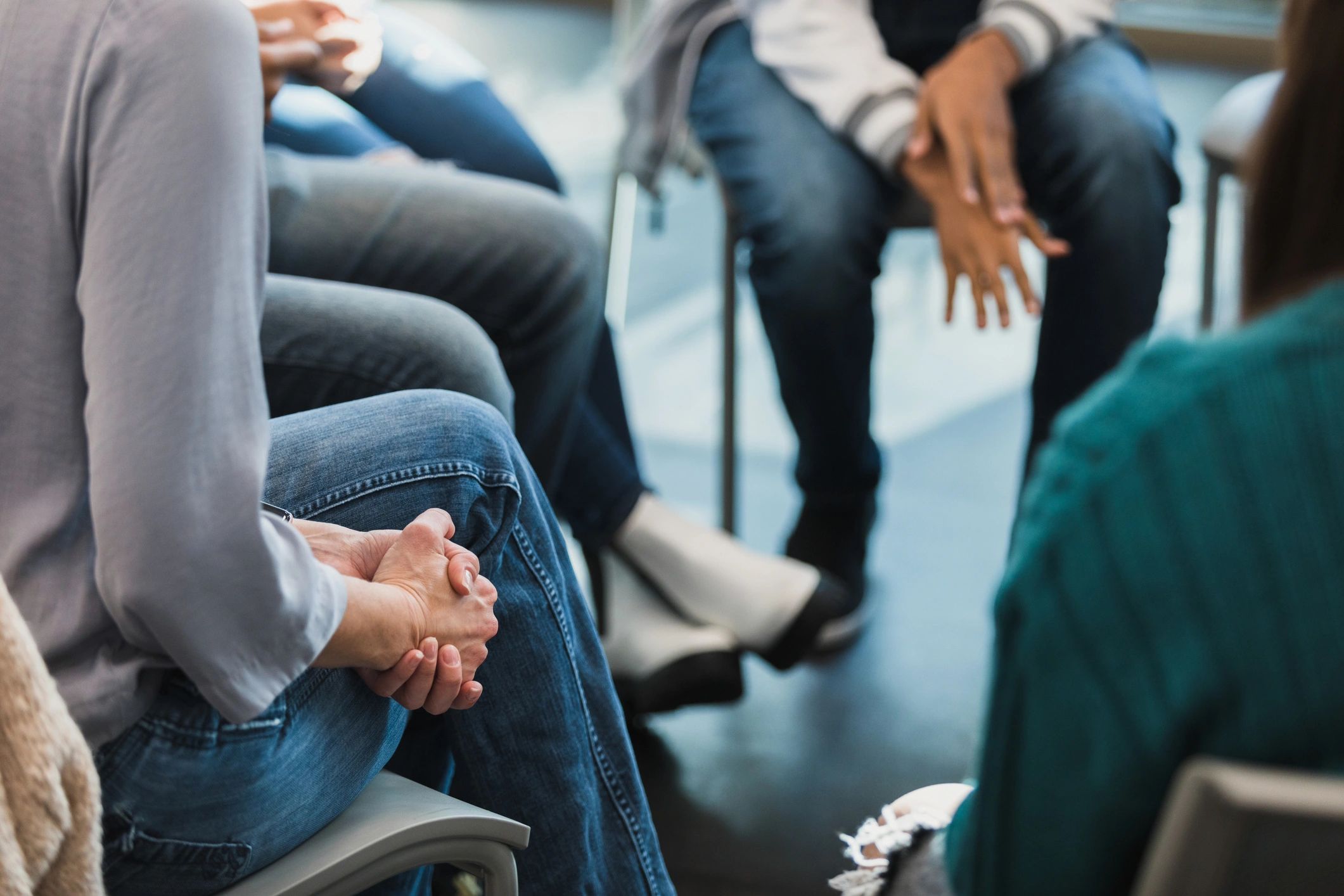 Group seated in a circle for a supportive discussion