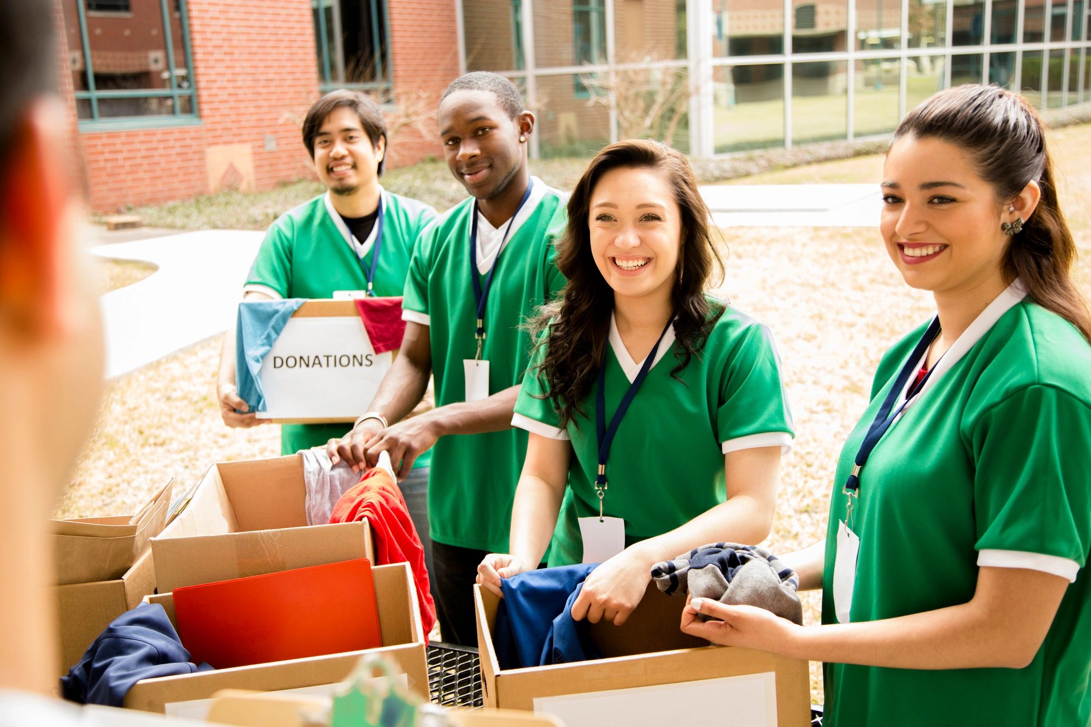 Volunteers collect clothing donations for community